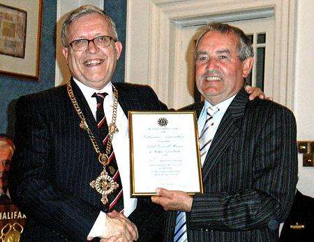 Paul Hume receives his 40-year scroll. pic:TG