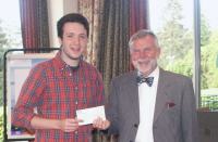 William Miller receiving cheque from Paul Kennedy pic:HN