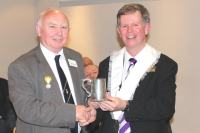 Brian Salmon receives the Scunthorpe Tankard. pic:BS
