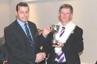 Justin Park receives the Joe Reilly Cup. pic:BS