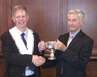 Tony Deighton receives the Loving Cup