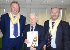 Micahel Bligh receives his 40-year scroll
